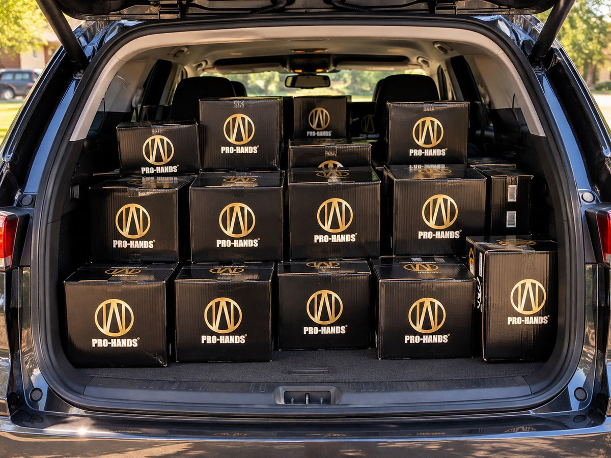 SUV loaded with PRO-HANDS SPORTS product boxes for face-to-face selling and customer events